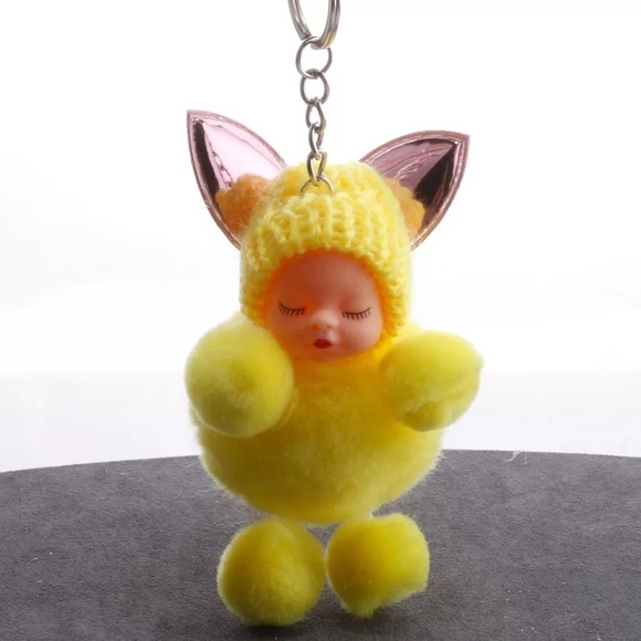 SLEEPY BABY WITH FAIRY WINGS SMALL POMPON IN YELLOW KEYCHAIN CHARM - Picture 6 of 6